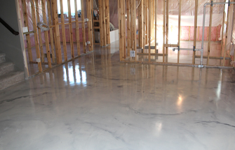 A brand new epoxy floor in a new development. It's just the skeleton of a structure with a beautiful floor.